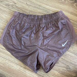 Nike dri-fit metallic rose gold shorts in size medium